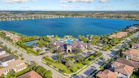 an aerial view of house with yard