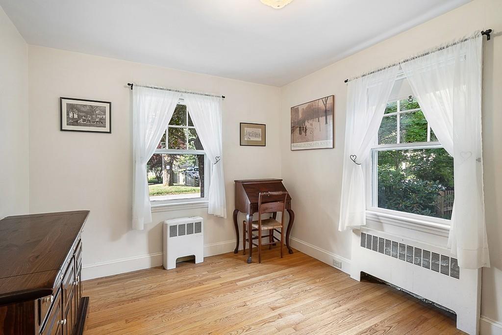79 Pleasant Street Manchester, MA 01944 - Photo 16 of 28 a view of a livingroom with furniture and a window