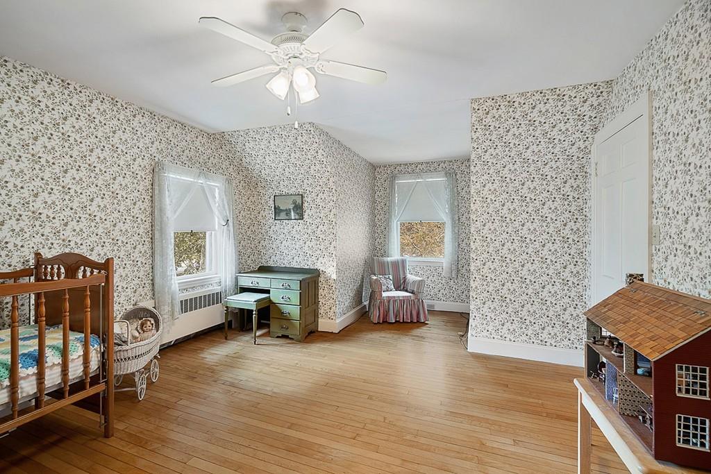 79 Pleasant Street Manchester, MA 01944 - Photo 19 of 28 a living room with furniture and a wooden floor