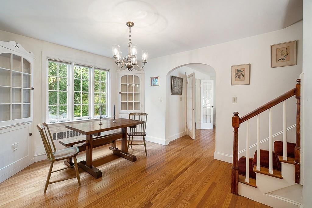 79 Pleasant Street Manchester, MA 01944 - Photo 20 of 28 a view of a dining room with furniture window and wooden floor