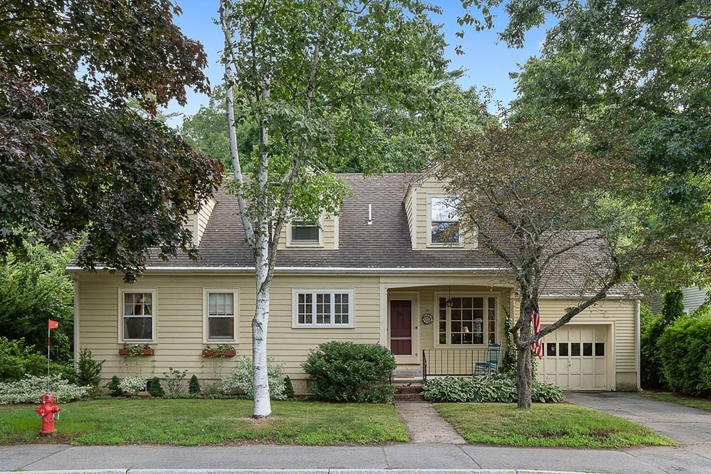79 Pleasant Street Manchester, MA 01944 - Photo 2 of 28 front view of house with a yard