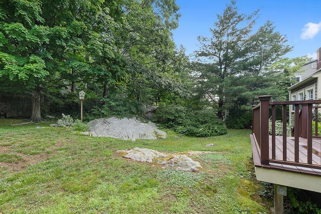 79 Pleasant Street Manchester, MA 01944 - Photo 26 of 28 a view of backyard with green space