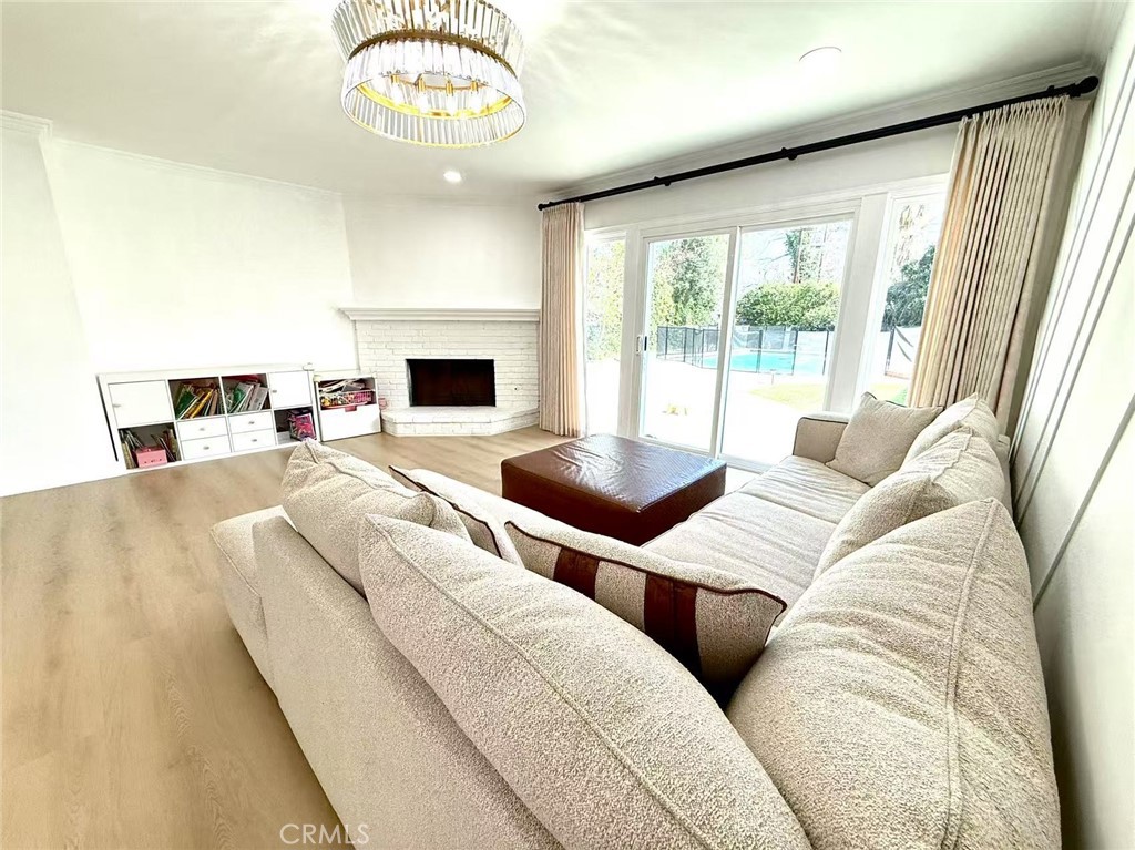 1500 Loganrita Avenue Arcadia, CA 91006 - Photo 11 of 29 a living room with furniture and a fireplace