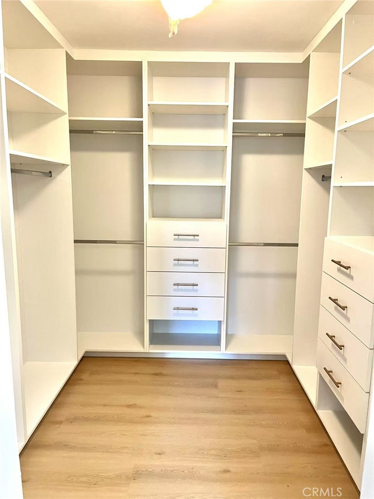 1500 Loganrita Avenue Arcadia, CA 91006 - Photo 14 of 29 a view of walk in closet with empty racks