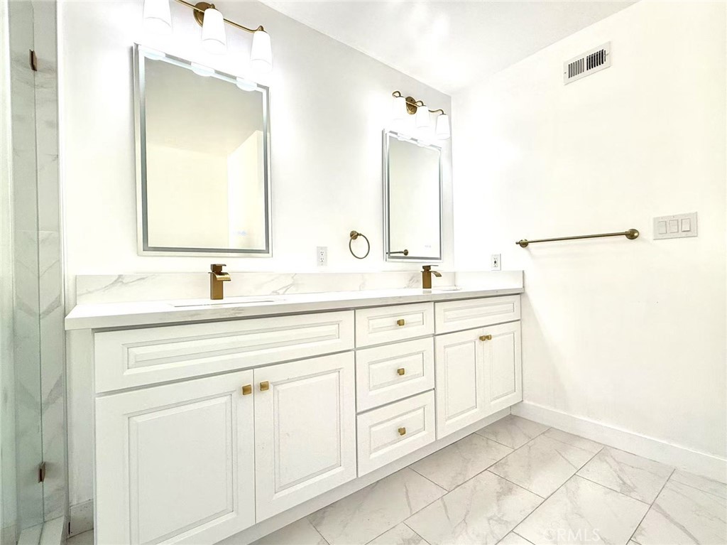 1500 Loganrita Avenue Arcadia, CA 91006 - Photo 15 of 29 a bathroom with a sink and a mirror