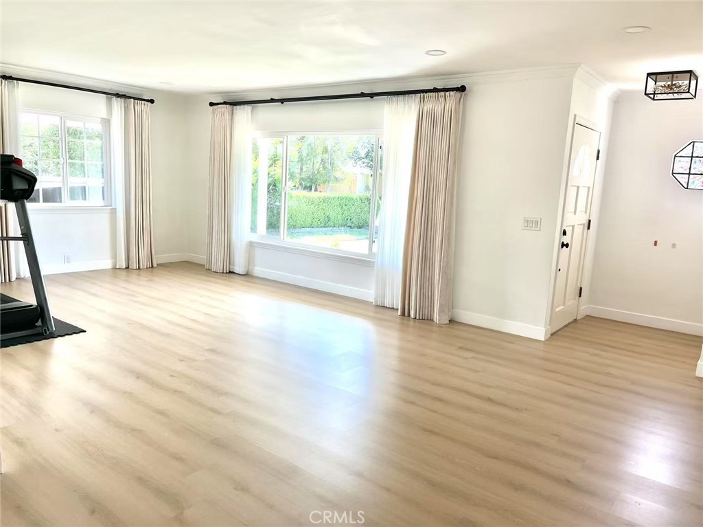 1500 Loganrita Avenue Arcadia, CA 91006 - Photo 4 of 29 a view of a room with wooden floor and a window
