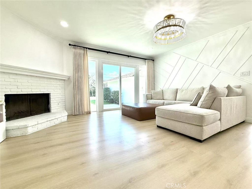 1500 Loganrita Avenue Arcadia, CA 91006 - Photo 9 of 29 a living room with furniture and a fireplace