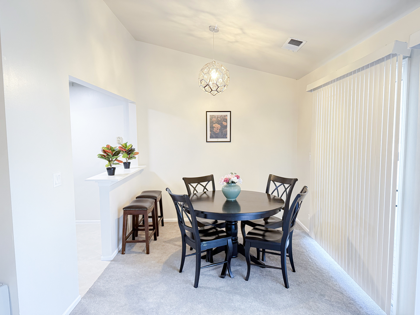 151 Brookston Drive, Unit A2 Schaumburg, IL 60193 - Photo 4 of 18 a view of a dining room with furniture and chandelier