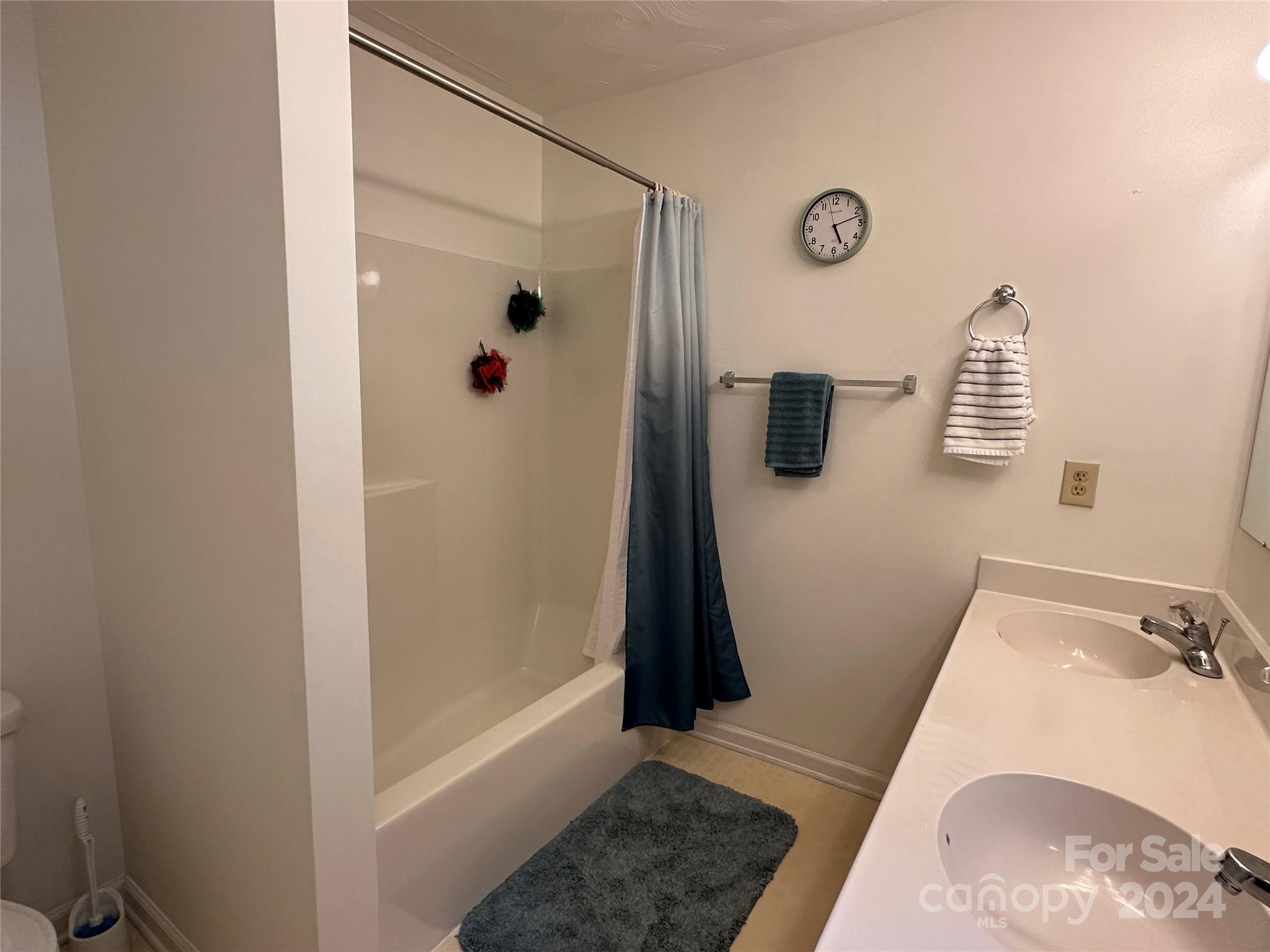 4886 Sandstone Drive Conover, NC 28613 - Photo 11 of 22 a bathroom with a tub and shower