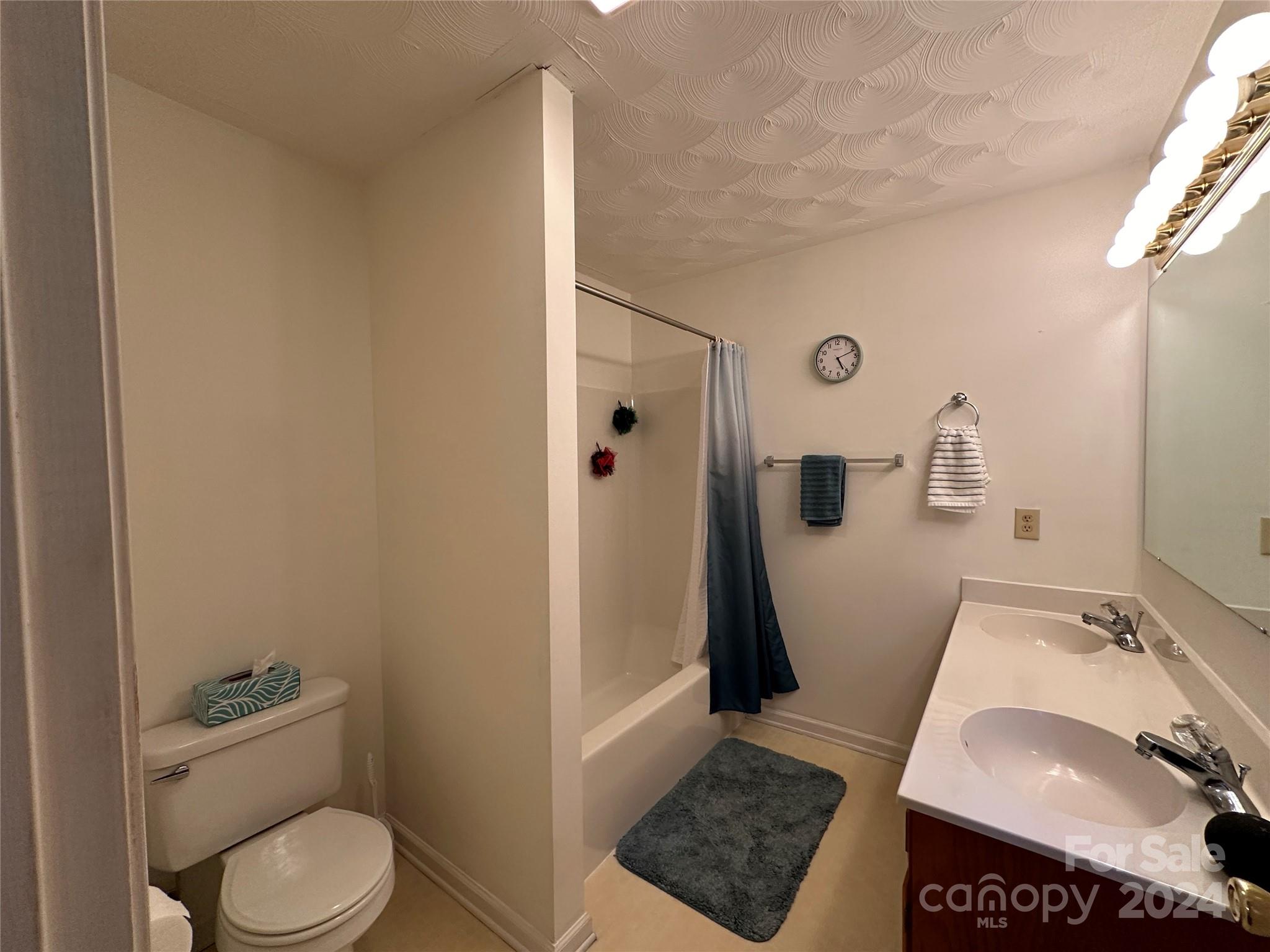 4886 Sandstone Drive Conover, NC 28613 - Photo 12 of 22 a bathroom with a toilet and a sink