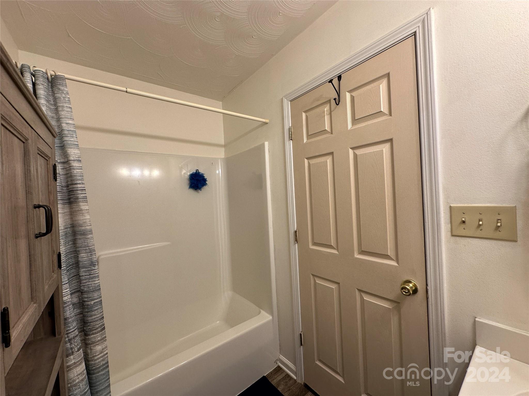 4886 Sandstone Drive Conover, NC 28613 - Photo 17 of 22 a bathroom with a shower
