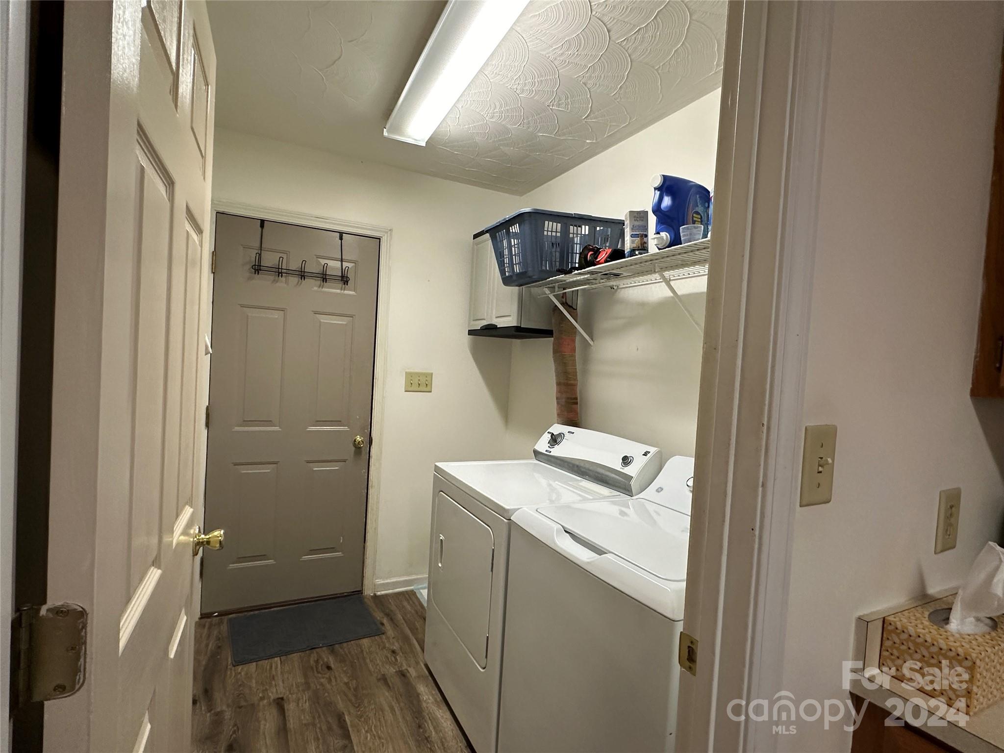 4886 Sandstone Drive Conover, NC 28613 - Photo 20 of 22 a utility room with dryer and washer
