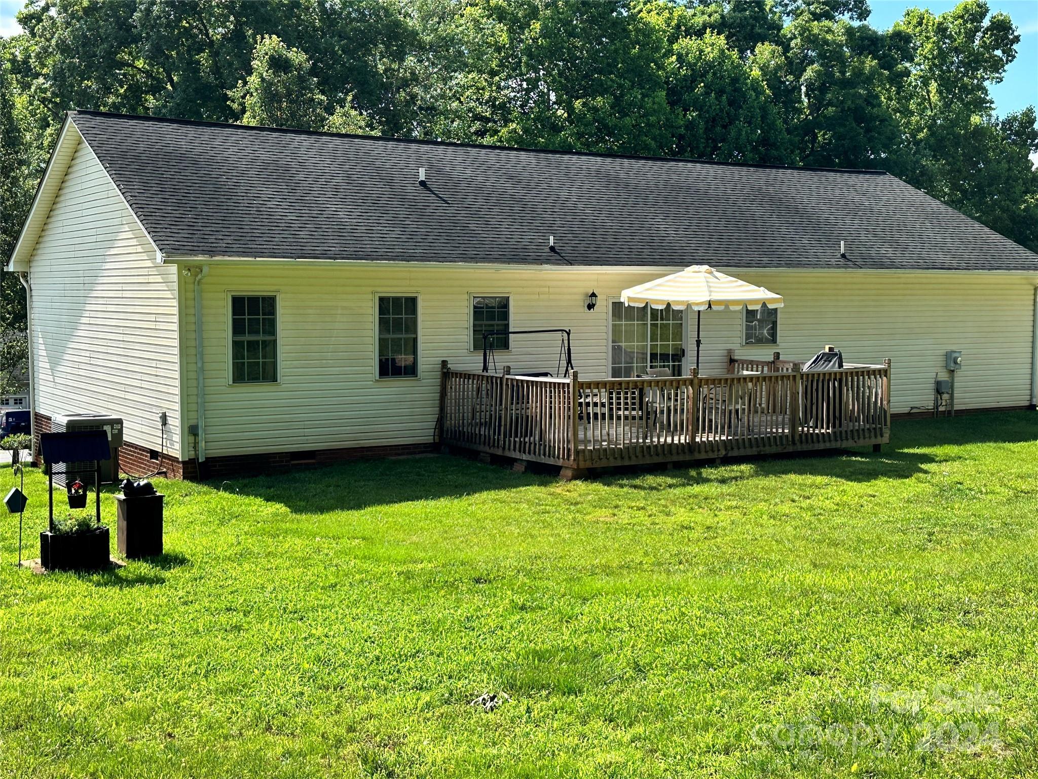 4886 Sandstone Drive Conover, NC 28613 - Photo 21 of 22 a view of a house with backyard and sitting area