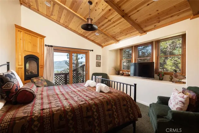 a bedroom with furniture and windows