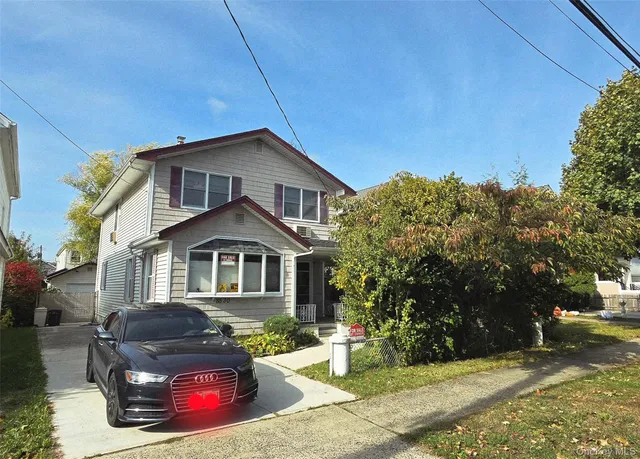 a house view with a garden space