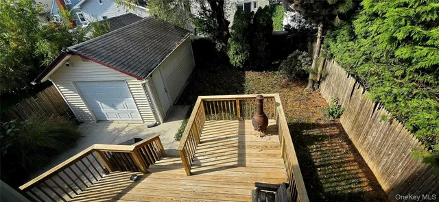 a view of house with trees in the background
