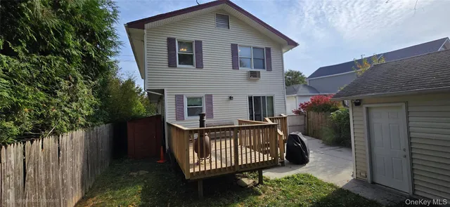 a bed room with a bed and a chair