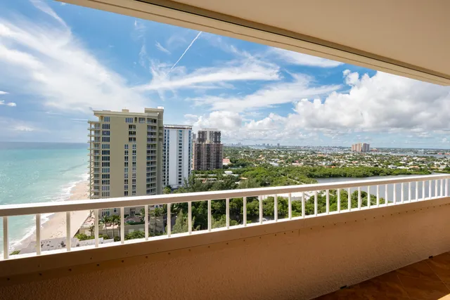 a view of a building from a balcony