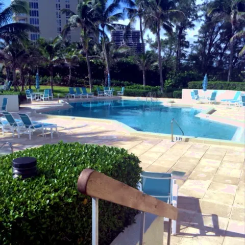 a view of sitting area with wooden walls