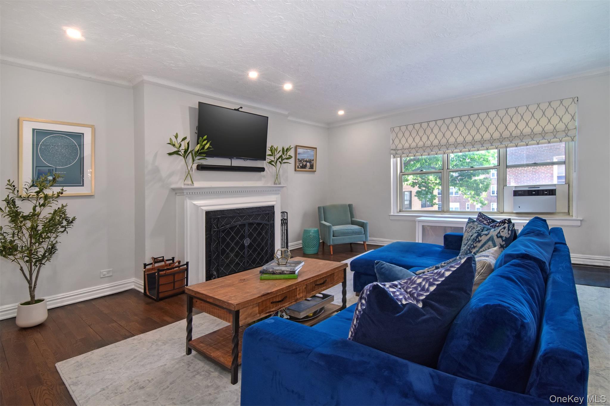 250 Bronxville Road, Unit 3I Bronxville, NY 10708 - Photo 7 of 17 a living room with furniture fireplace and window