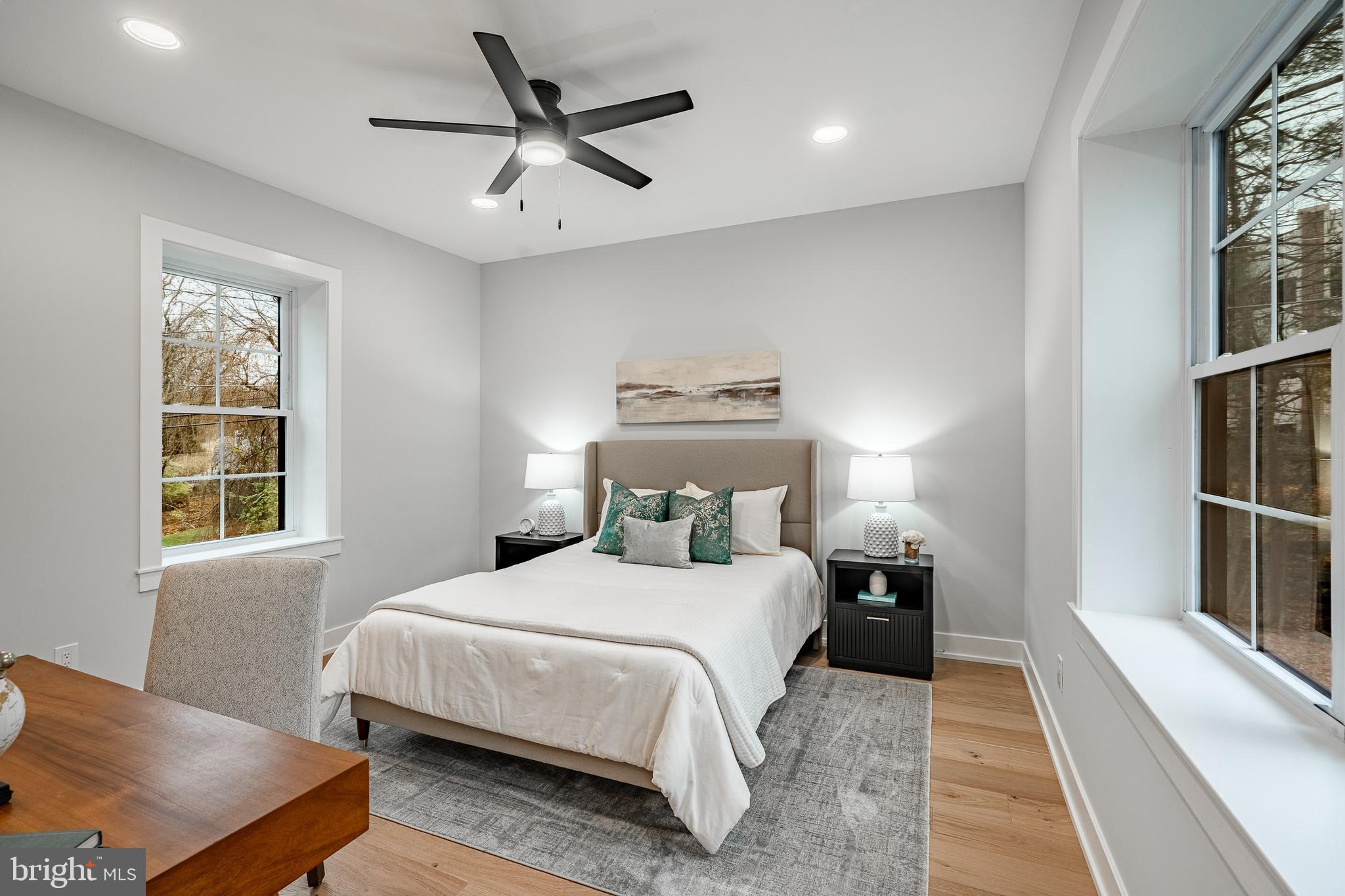 714 South Wayne Street West Chester, PA 19382 - Photo 23 of 62 a bedroom with a bed and wooden floor
