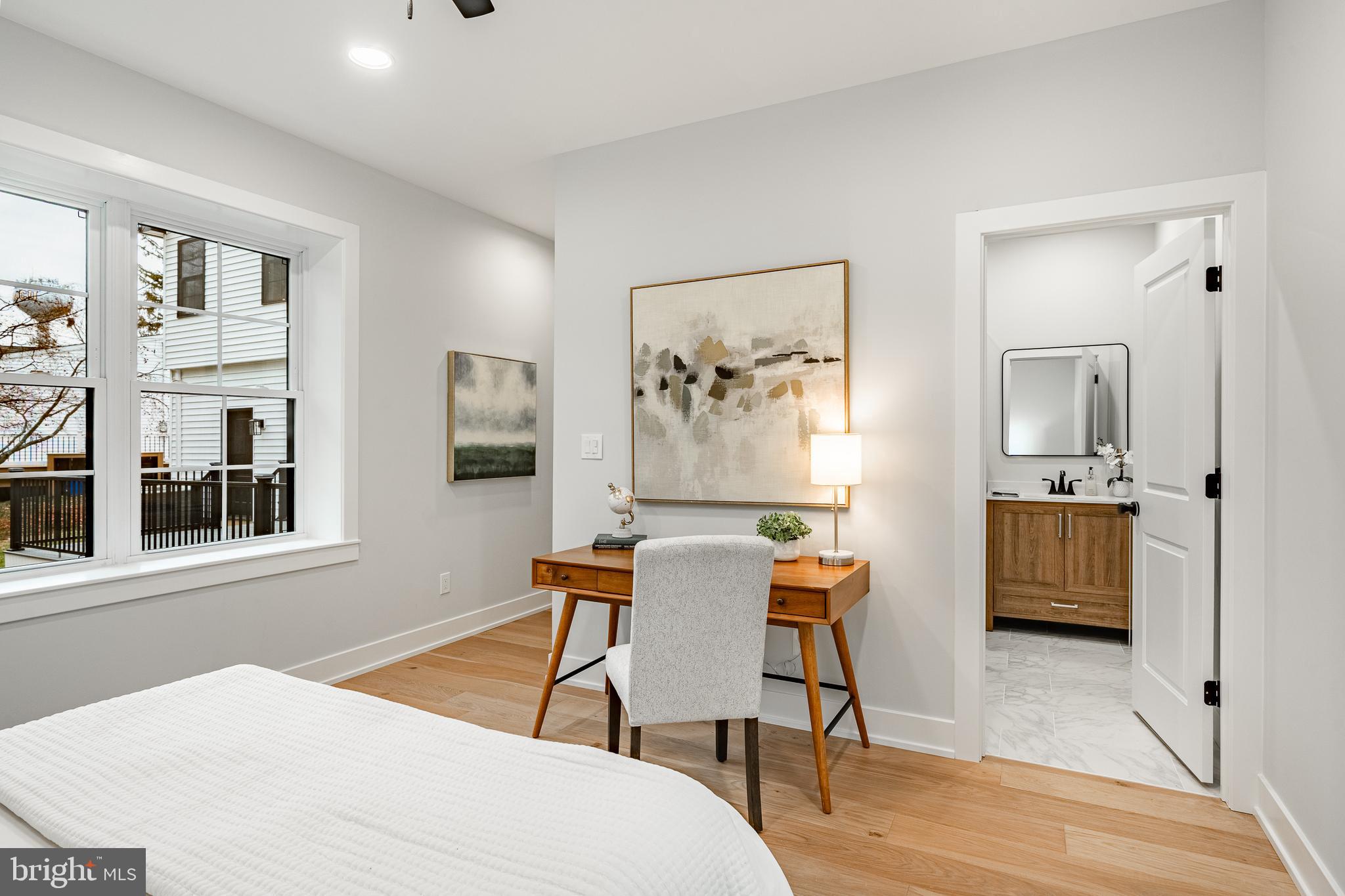 714 South Wayne Street West Chester, PA 19382 - Photo 24 of 62 a bedroom with a bed and a table in it