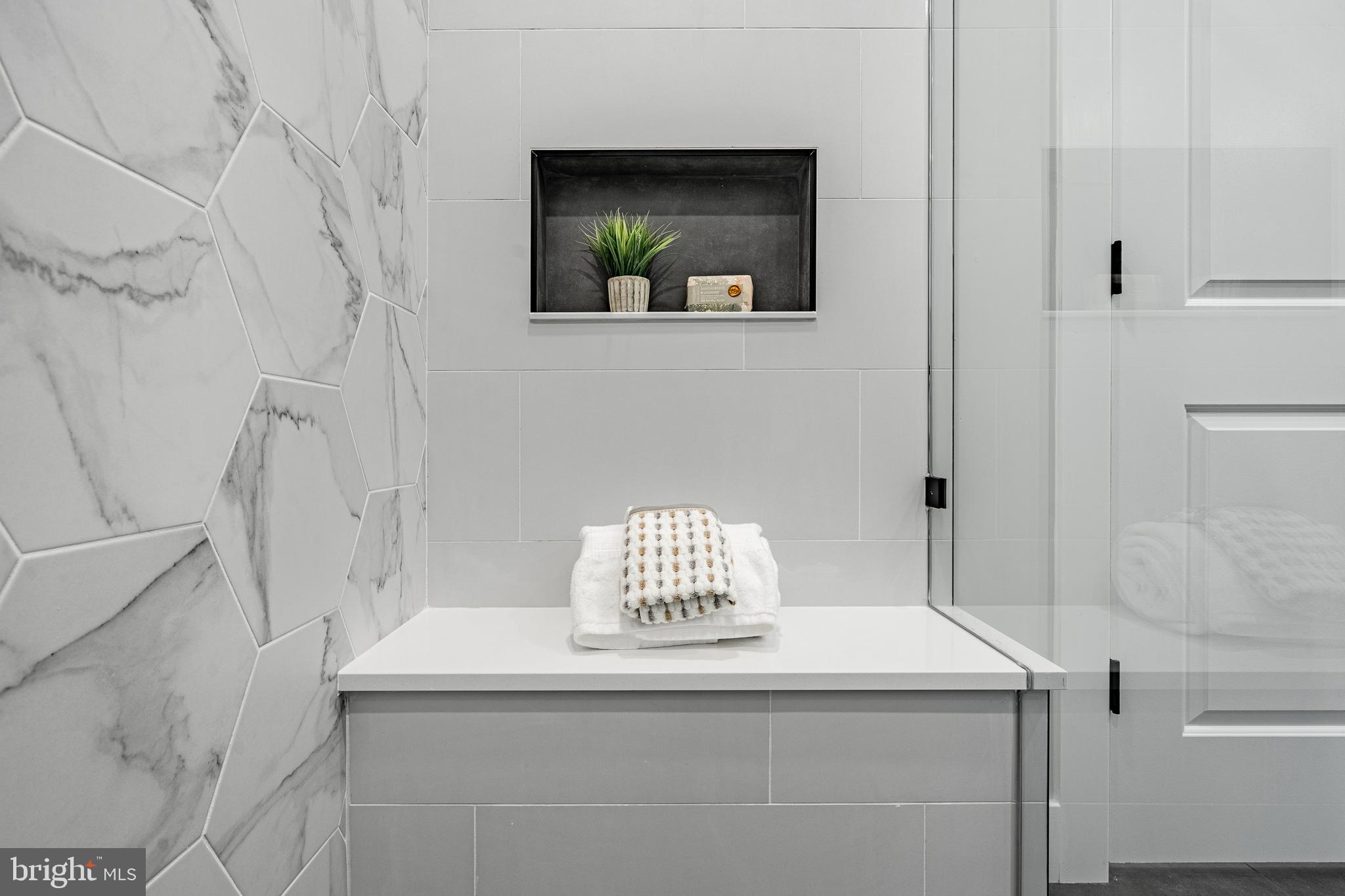 714 South Wayne Street West Chester, PA 19382 - Photo 42 of 62 a bathroom with a sink and mirror