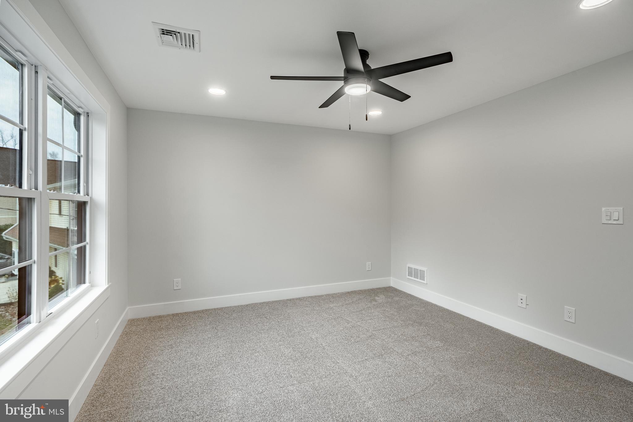 714 South Wayne Street West Chester, PA 19382 - Photo 44 of 62 wooden floor in an empty room with a window