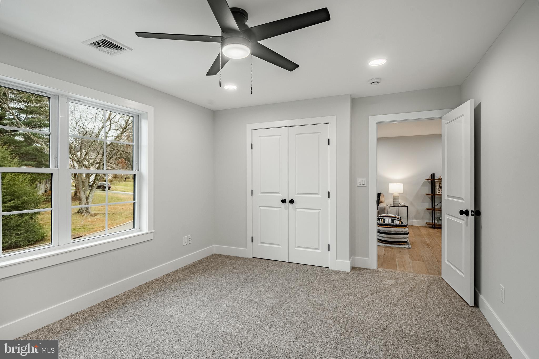 714 South Wayne Street West Chester, PA 19382 - Photo 48 of 62 a view of empty room with wooden floor and windows