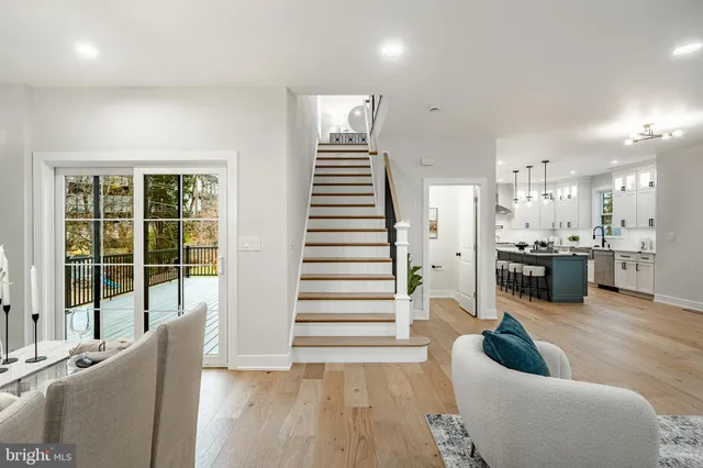a living room with furniture and windows