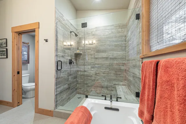a bathroom with a sink and shower