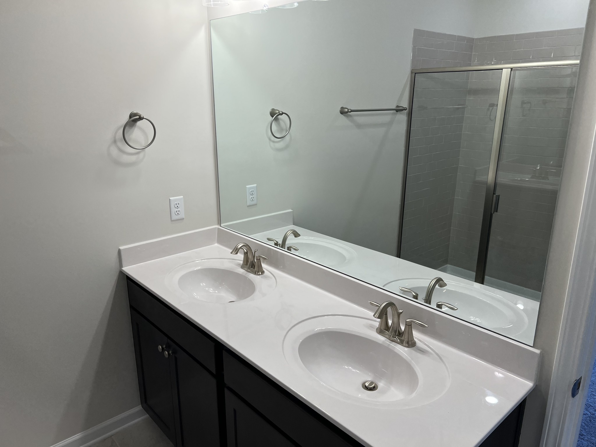 154 Jackson Alan Drive Murfreesboro, TN 37130 - Photo 6 of 10 a bathroom with a sink and a mirror