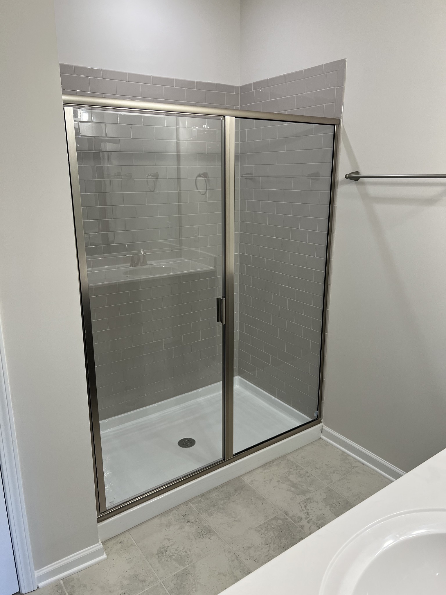 154 Jackson Alan Drive Murfreesboro, TN 37130 - Photo 7 of 10 a bathroom with a glass shower door