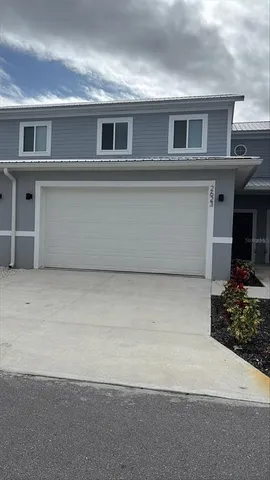 a front view of a house with yard