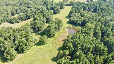a view of a lake with a house
