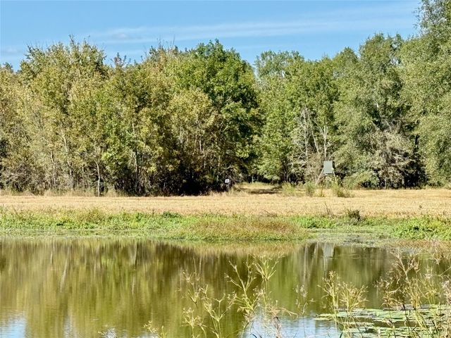 a view of swimming pool from a balcony