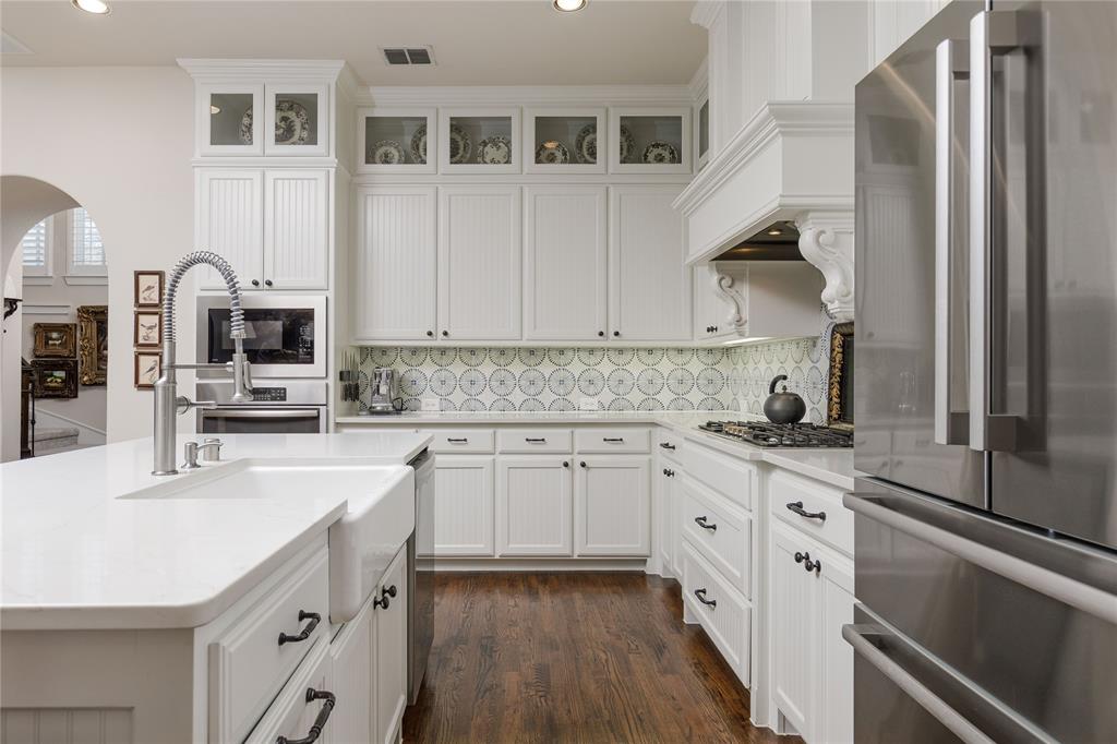 2500 Addison Street McKinney, TX 75071 - Photo 11 of 33 Kitchen is light and bright. Updated in 2024.