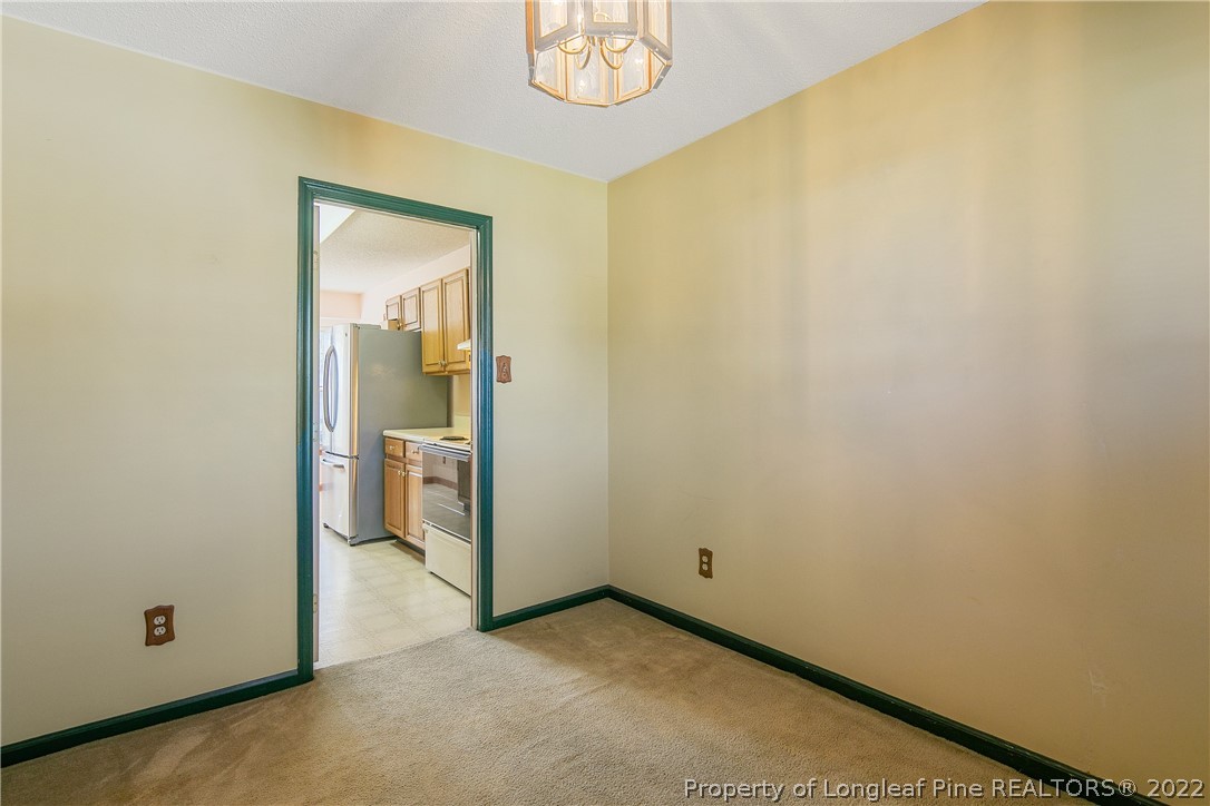 7455 Elliott Bridge Road Spring Lake, NC 28390 - Photo 8 of 49 a view of a hallway with closet