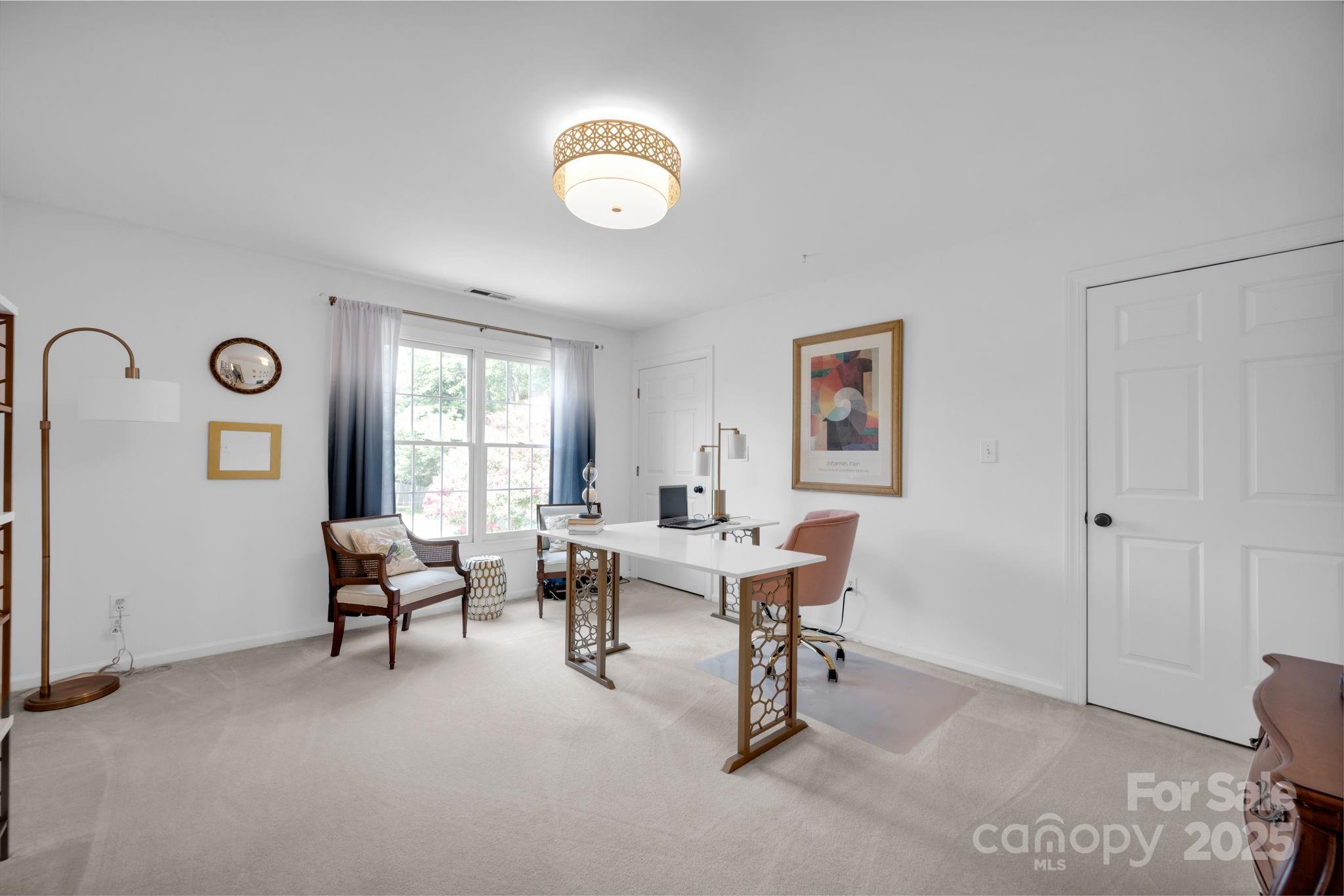 19577 Meta Road Cornelius, NC 28031 - Photo 32 of 45 a work room with furniture and window