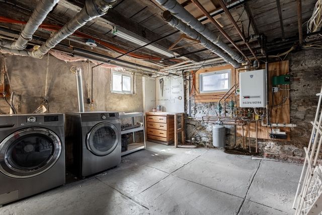 a front view of a house with a glass windows