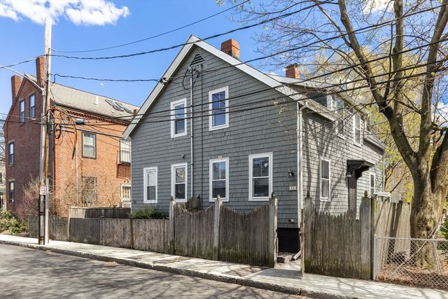 a park view with a bench and trees