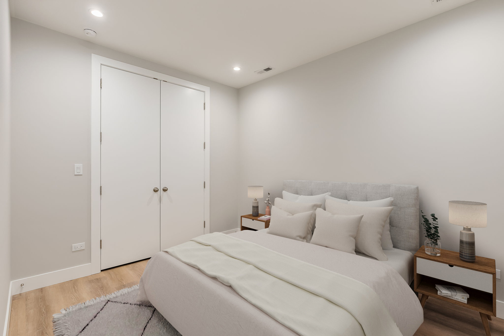 864 North State Street, Unit 2 Chicago, IL 60610 - Photo 17 of 21 a bedroom with a bed and a lamp