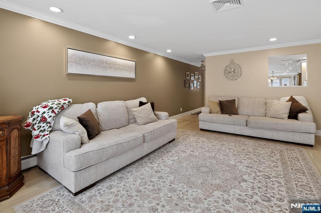 317 Ridge Road Rutherford, NJ 07070 - Photo 11 of 32 a living room with furniture and a couch