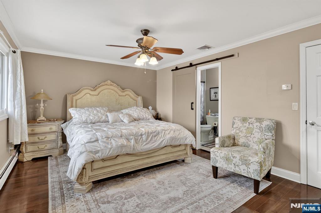 317 Ridge Road Rutherford, NJ 07070 - Photo 25 of 32 a bedroom with a bed and a couch