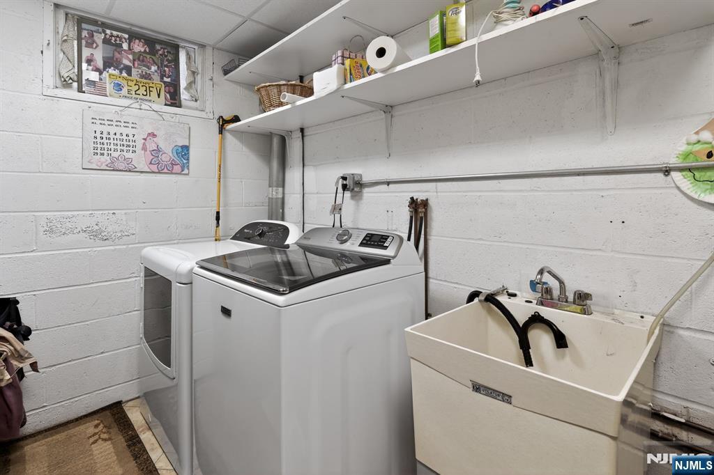 317 Ridge Road Rutherford, NJ 07070 - Photo 29 of 32 a utility room with dryer and washer