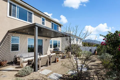 a view of a house with a patio
