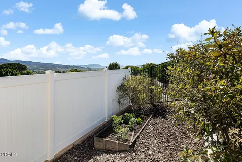a view of a lake in middle of the house