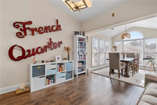 a kitchen with a sink and a stove top oven