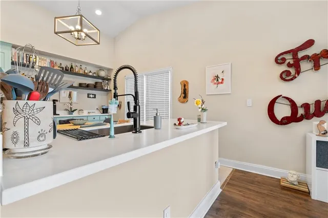 a dining room with a table and chairs