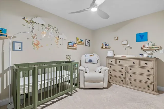 a bedroom with a bed furniture and a window
